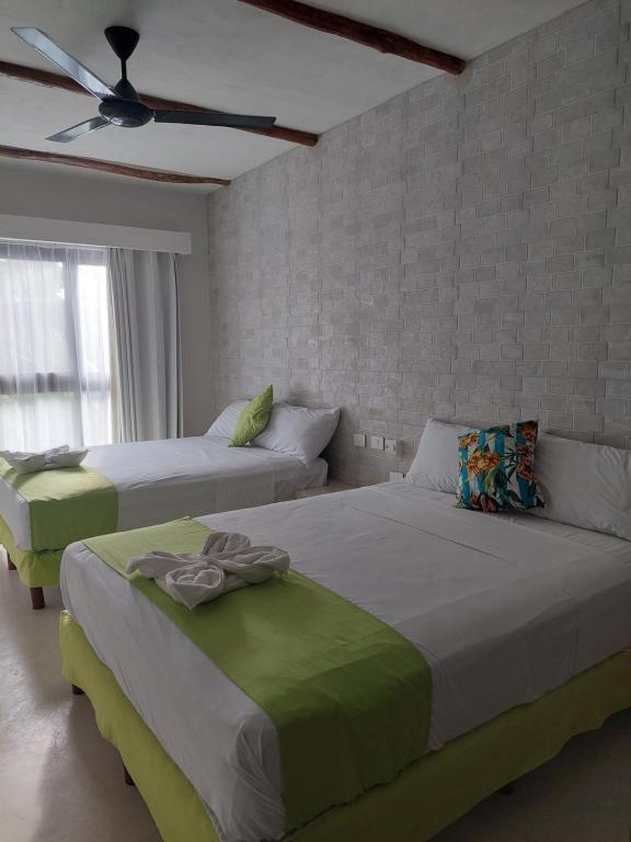 DOUBLE QUEEN SUITE WITH BALCONY MAYARI HOLBOX (3)